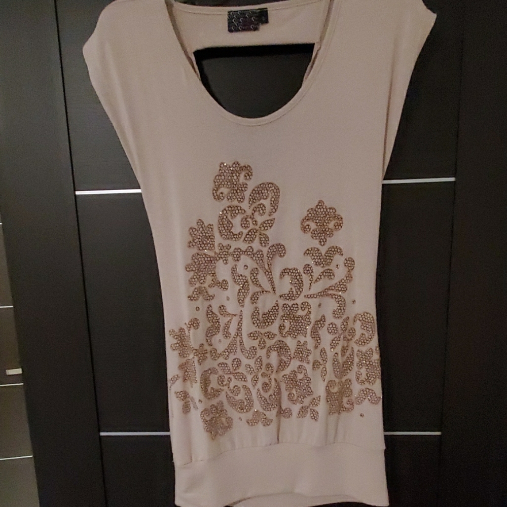 Tan sweater, sleeveless with gold sparkle design